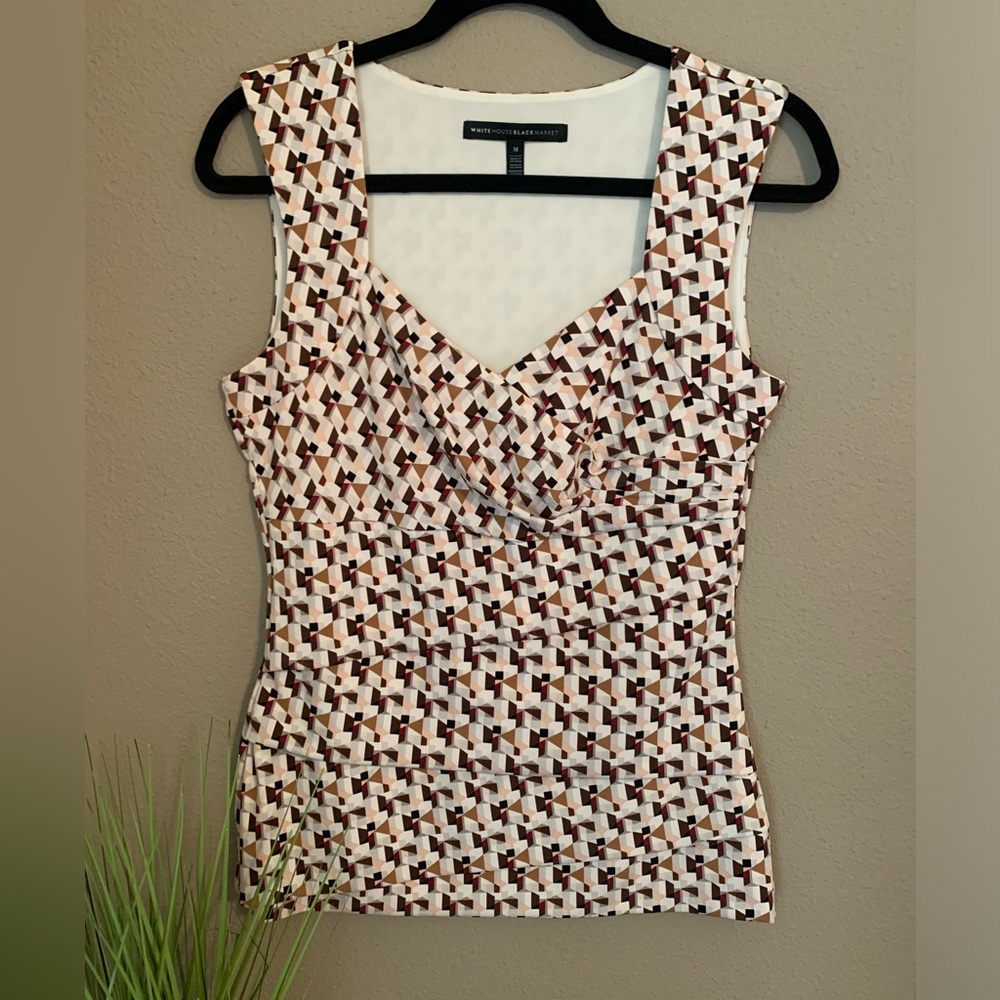 White House Black Market sleeveless blouse. Size M.